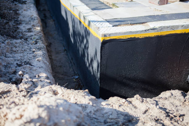 Professional Emergency Waterproofing technician working in Pineville, KY